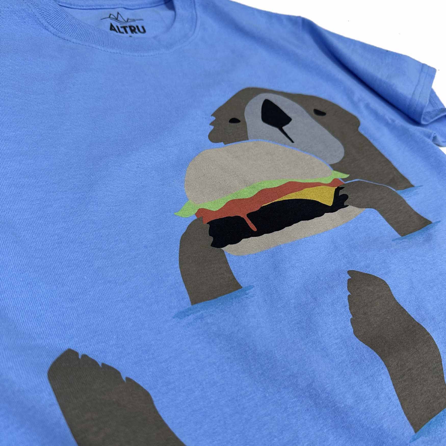 Otter Eating Hamburger graphic tee by Altru Apparel