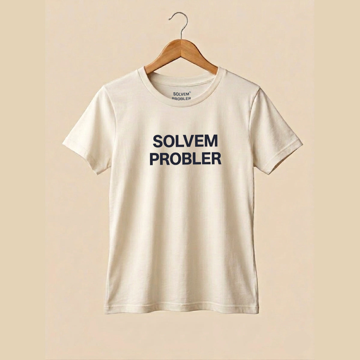 Vintage white t-shirt with "SOLVEM PROBLER" text on a beige background.