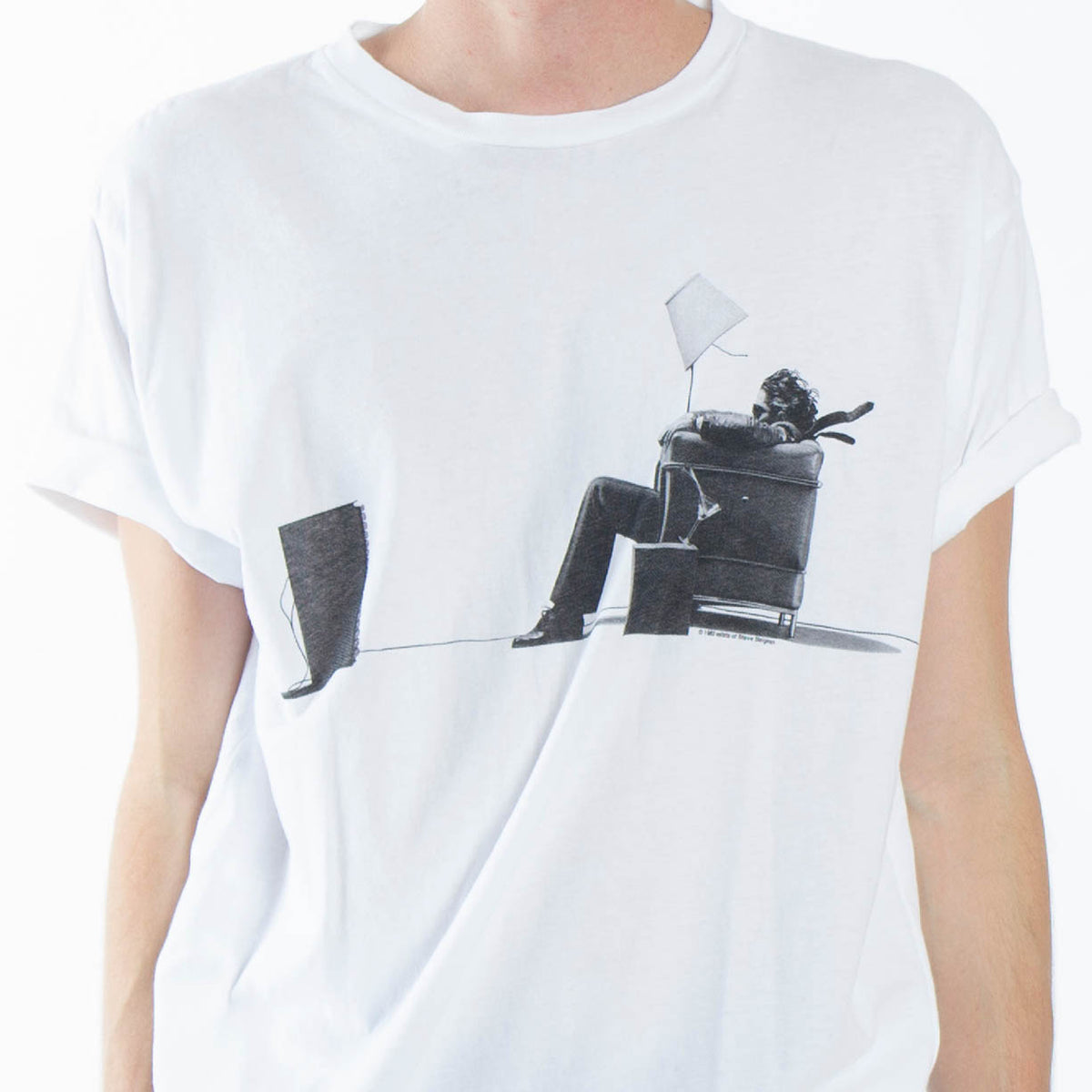 Altru Apparel's tee full front photo of Maxell blown away couch guy. Photo of male model wearing the t-shirt.