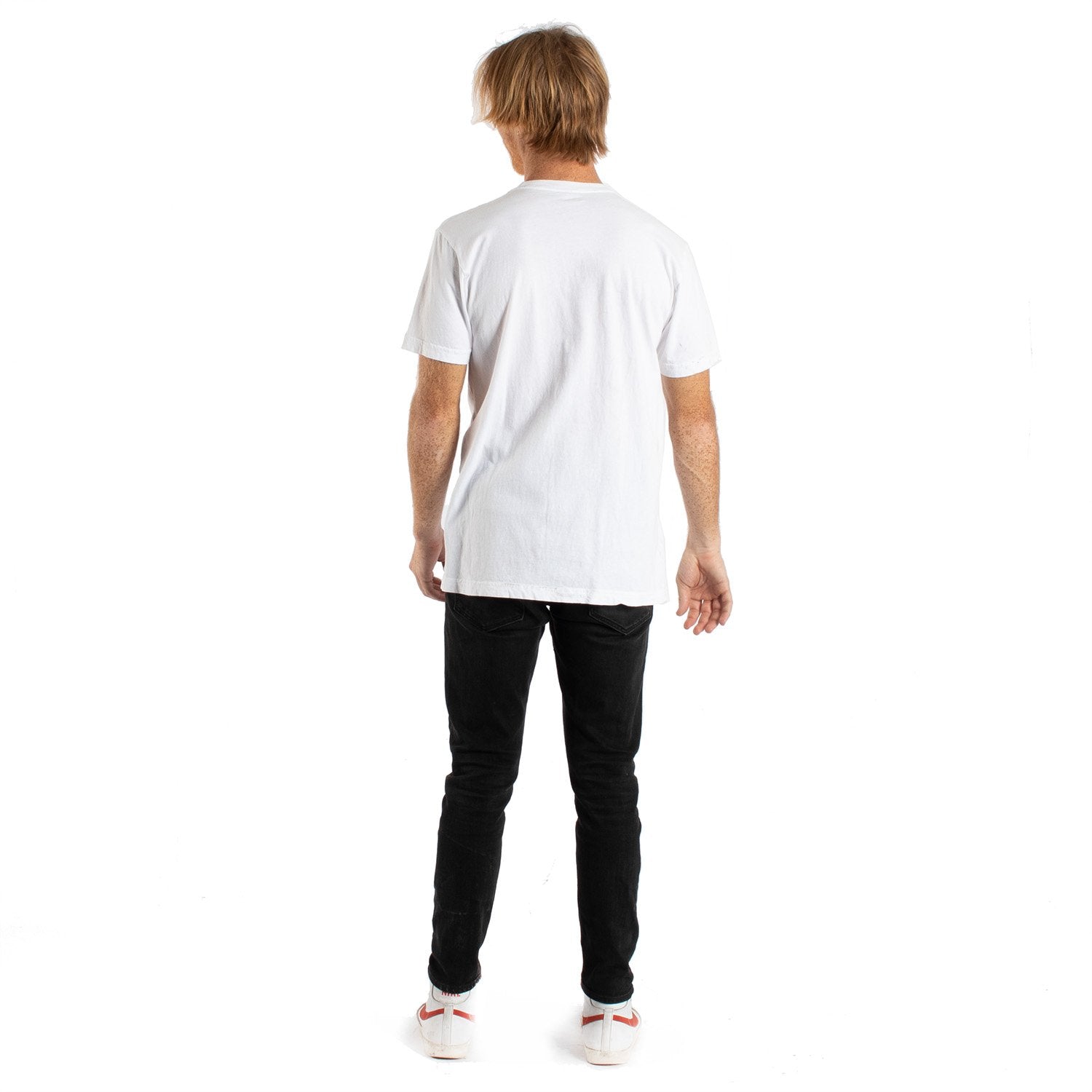 Happy faces graphics in a group on front of white t-shirt on a male model 2nd pose