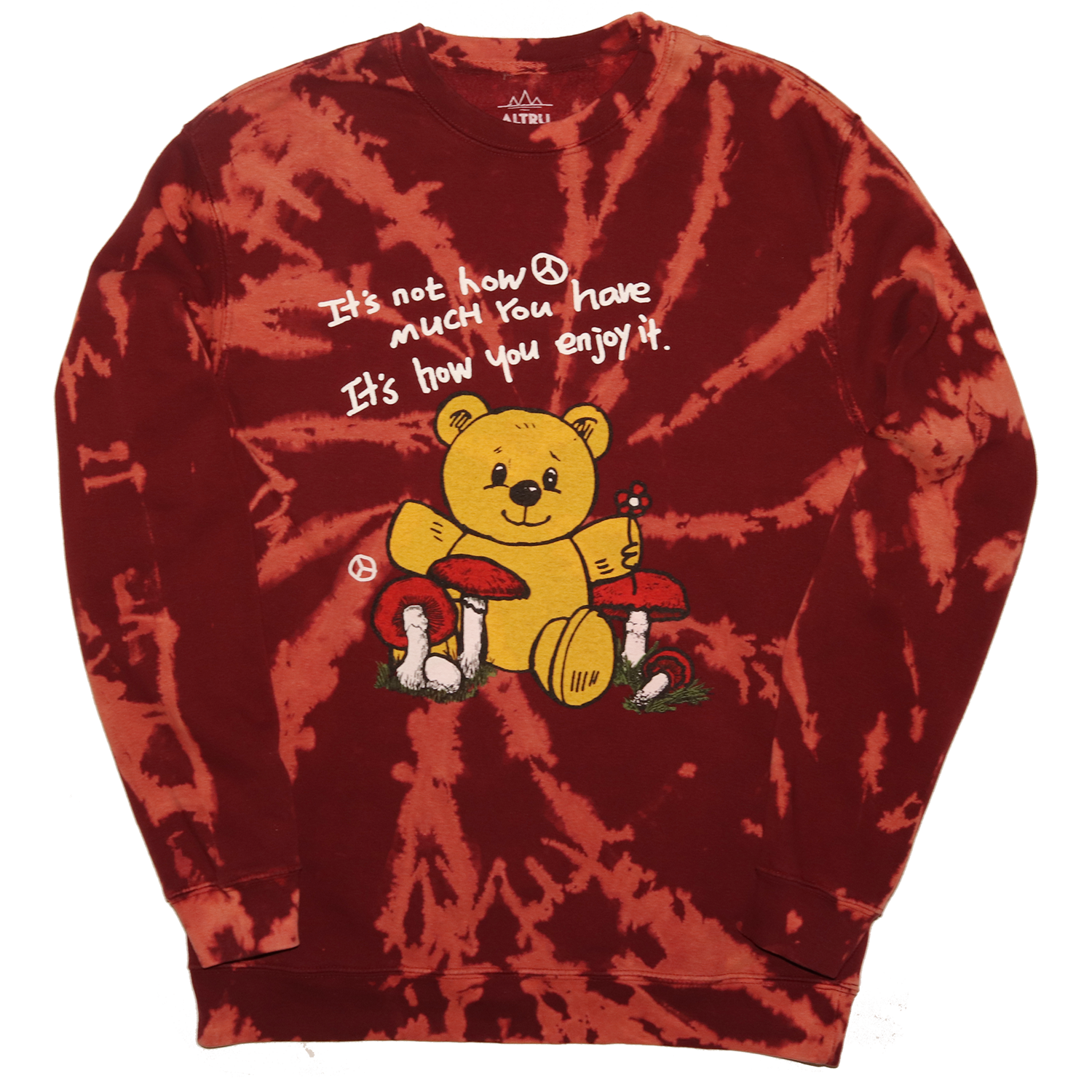 Full front photo of Teddy Bear sitting with mushrooms graphic printed on front of burgundy tie dye fleece fashion sweatshirt. Graphic includes bear, mushrooms, flower, peace sign and the text "It's not how much you have It's how you enjoy it".