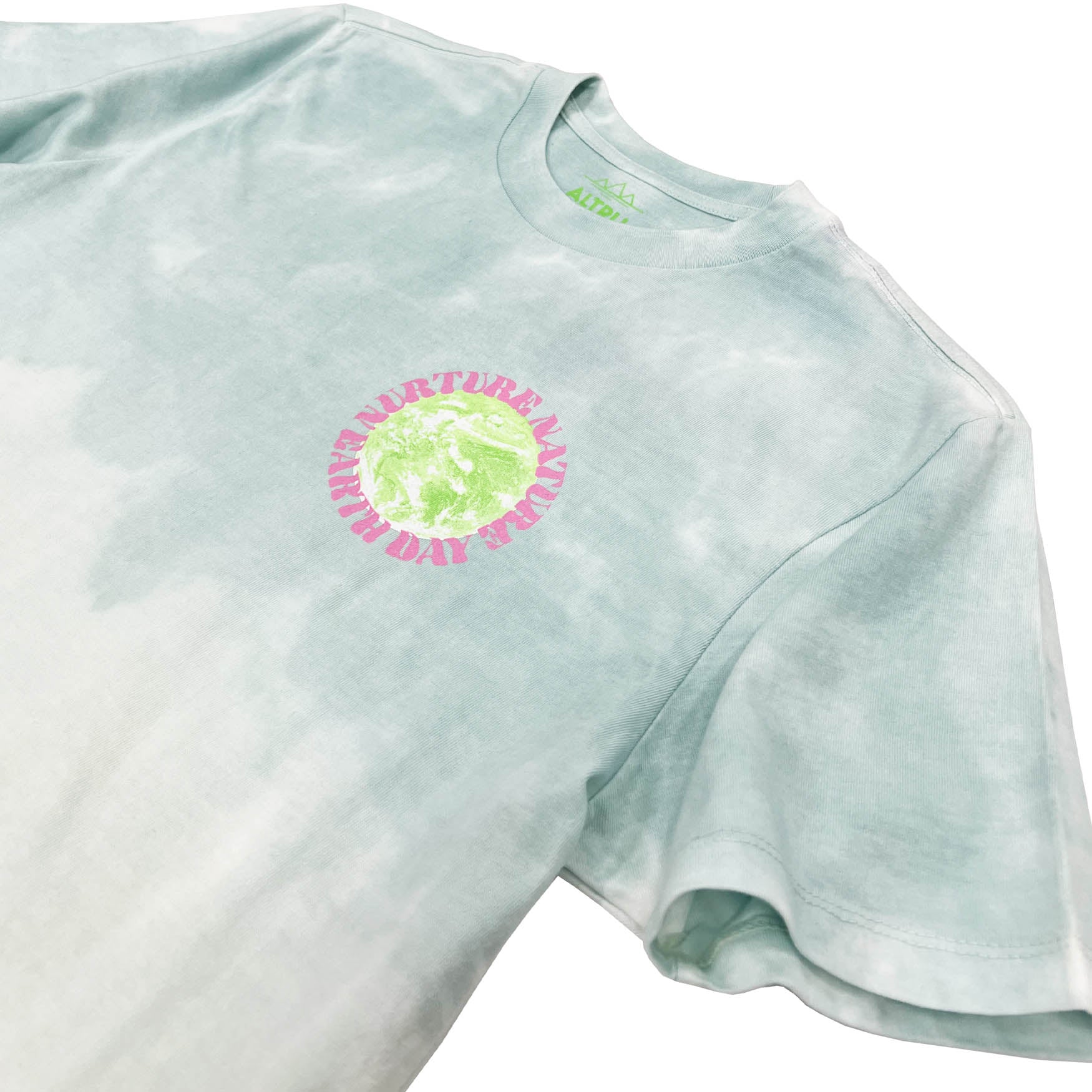 Altru Nurture Nature graphic on multi color dyed t-shirt. Chest graphic on the front.
