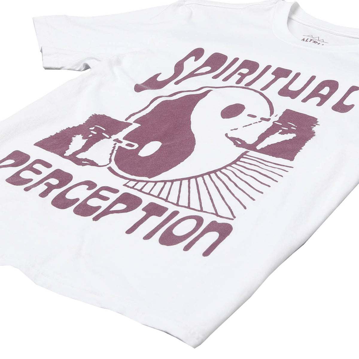 Front angle detail of white graphic tee with a yin yang symbol and text saying spiritual perception