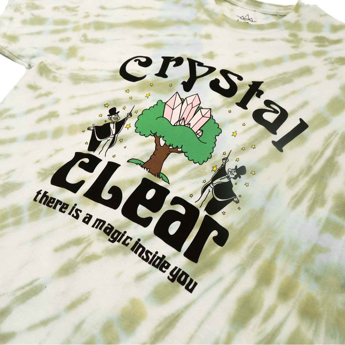 Green and white tie dye with graphic of crystals, tree, magician and motivational text screen printed on front of men's graphic tee. Front detail photo. #1