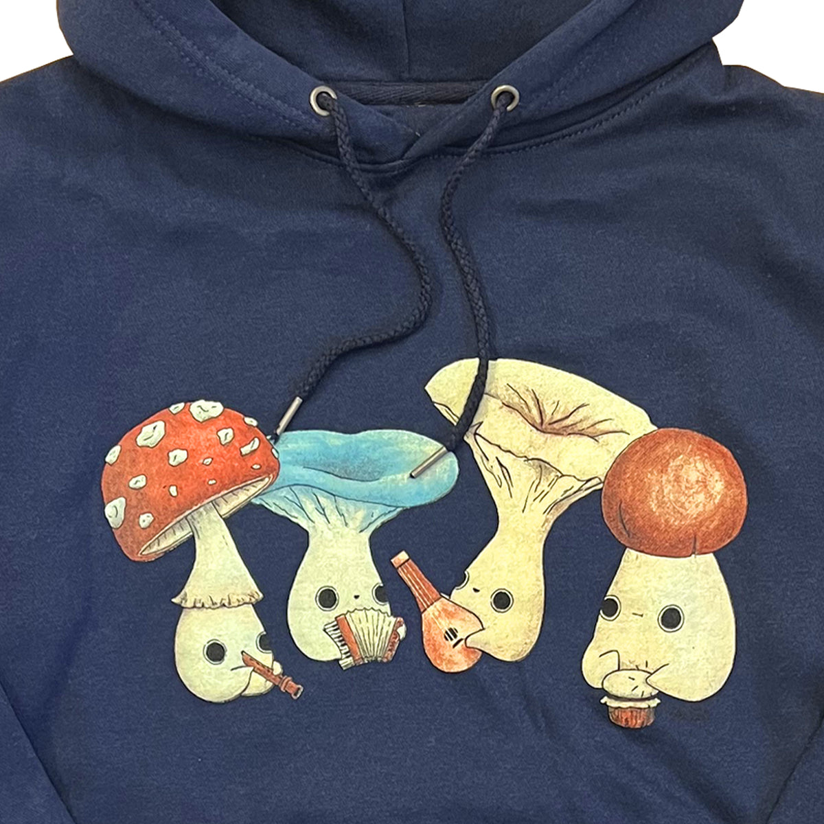 Altru The Fungus Mushlings graphic on front chest playing music on green tee by artist Abi Toads. Navy hoodie front photo close up