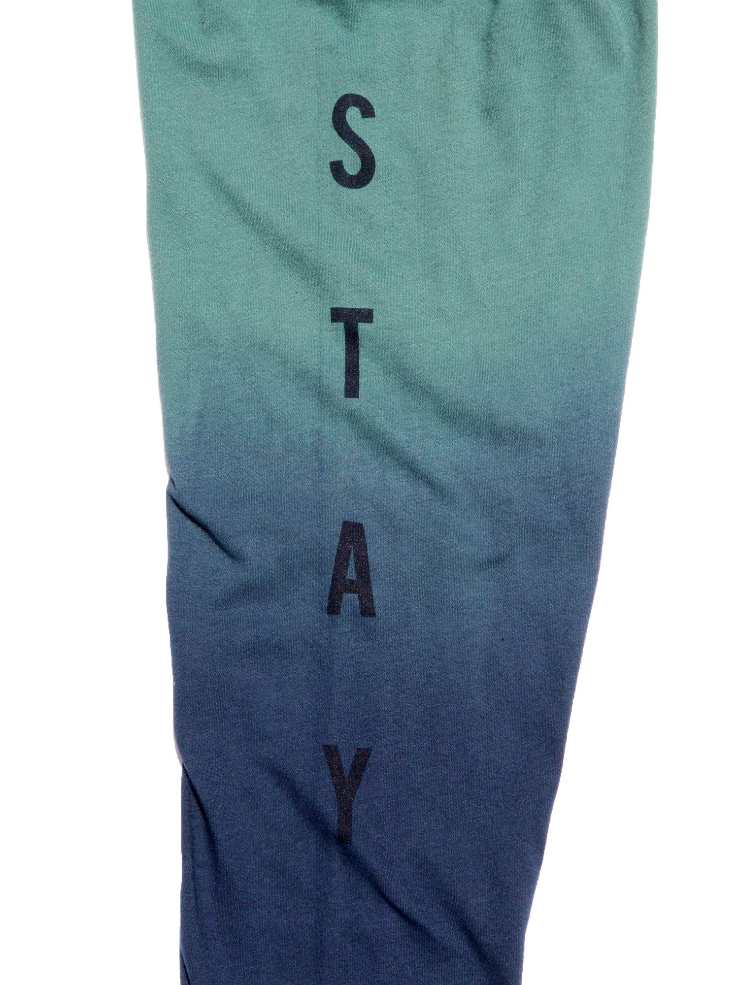 Close up detail image of the graphic text on the right sleeve with the word STAY